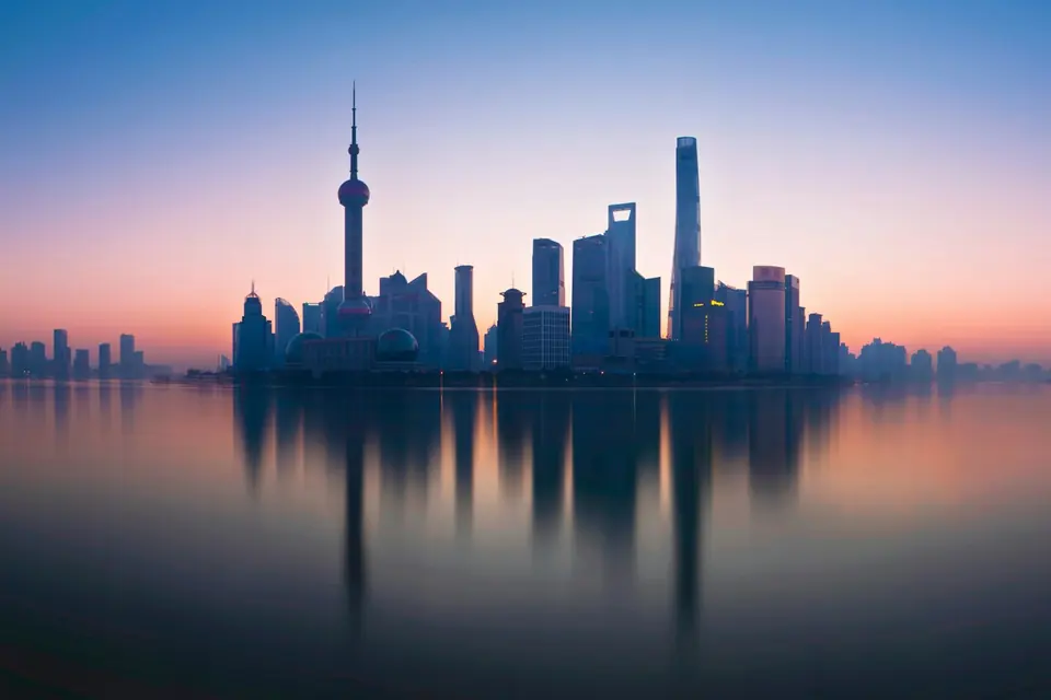 The Lujiazui skyline of Shanghai at dusk, seen across the Huangpu River